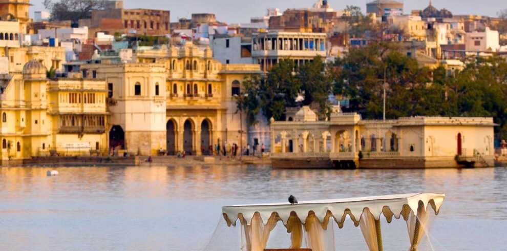 Scenic boat ride on Lake Pichola with City Palace view in Udaipur